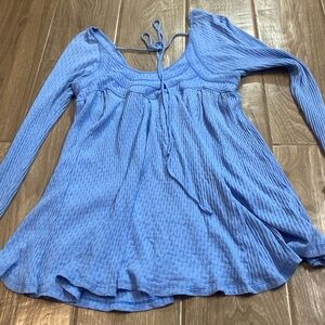Free People babydoll top blue size small. Small stain on inside of sleeve